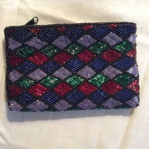 Vintage small zippered clutch from Neiman Marcus.